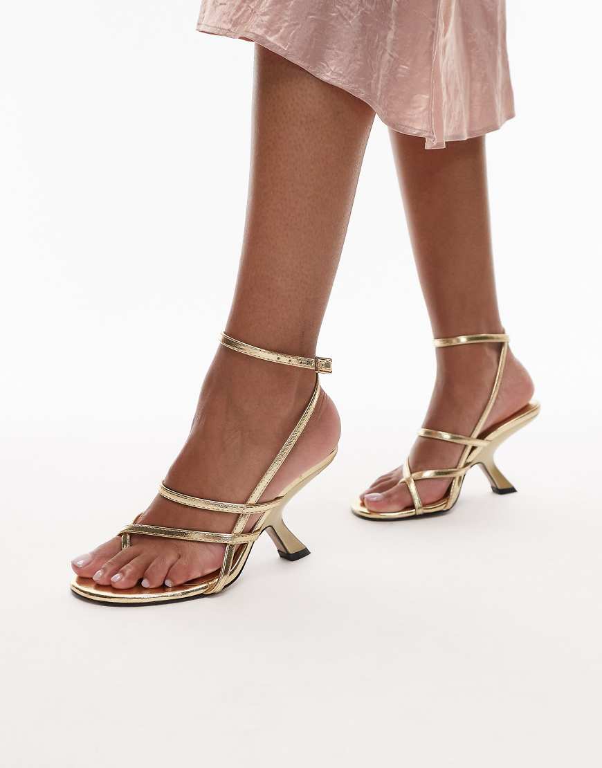 Indigo strappy angled heel mule in gold
