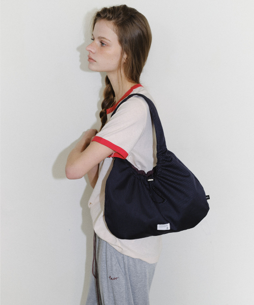 REVERSIBLE MINI HOBO BAG