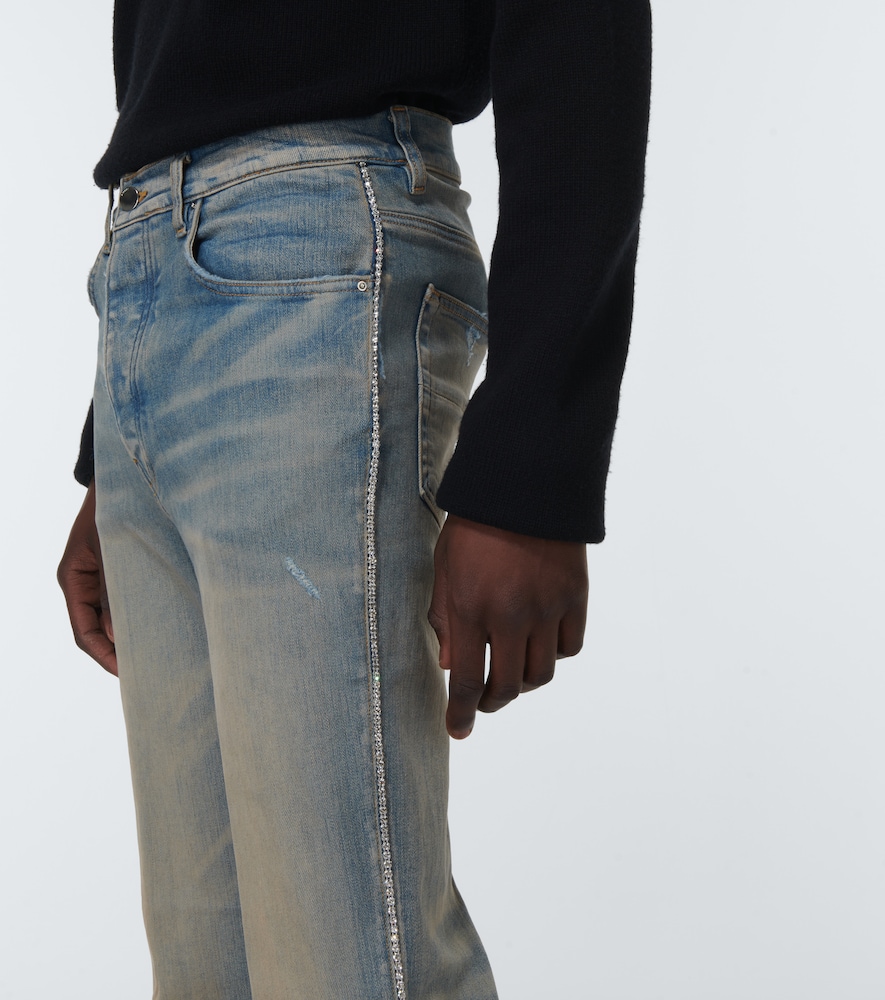 Distressed embellished denim jeans