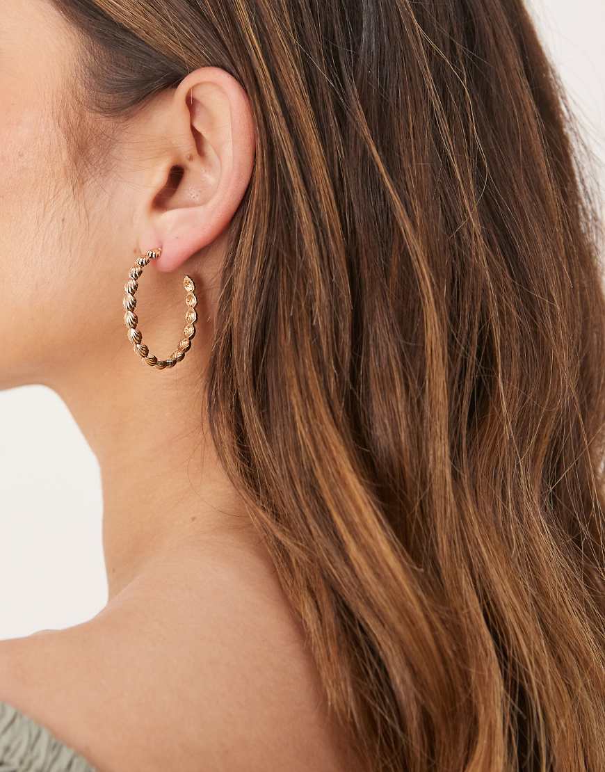 ASOS DESIGN hoop earrings with mini-shell detail in gold tone
