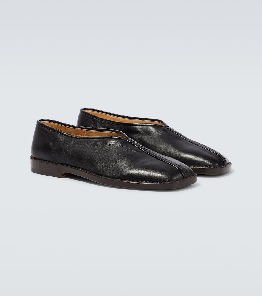 Piped leather loafers