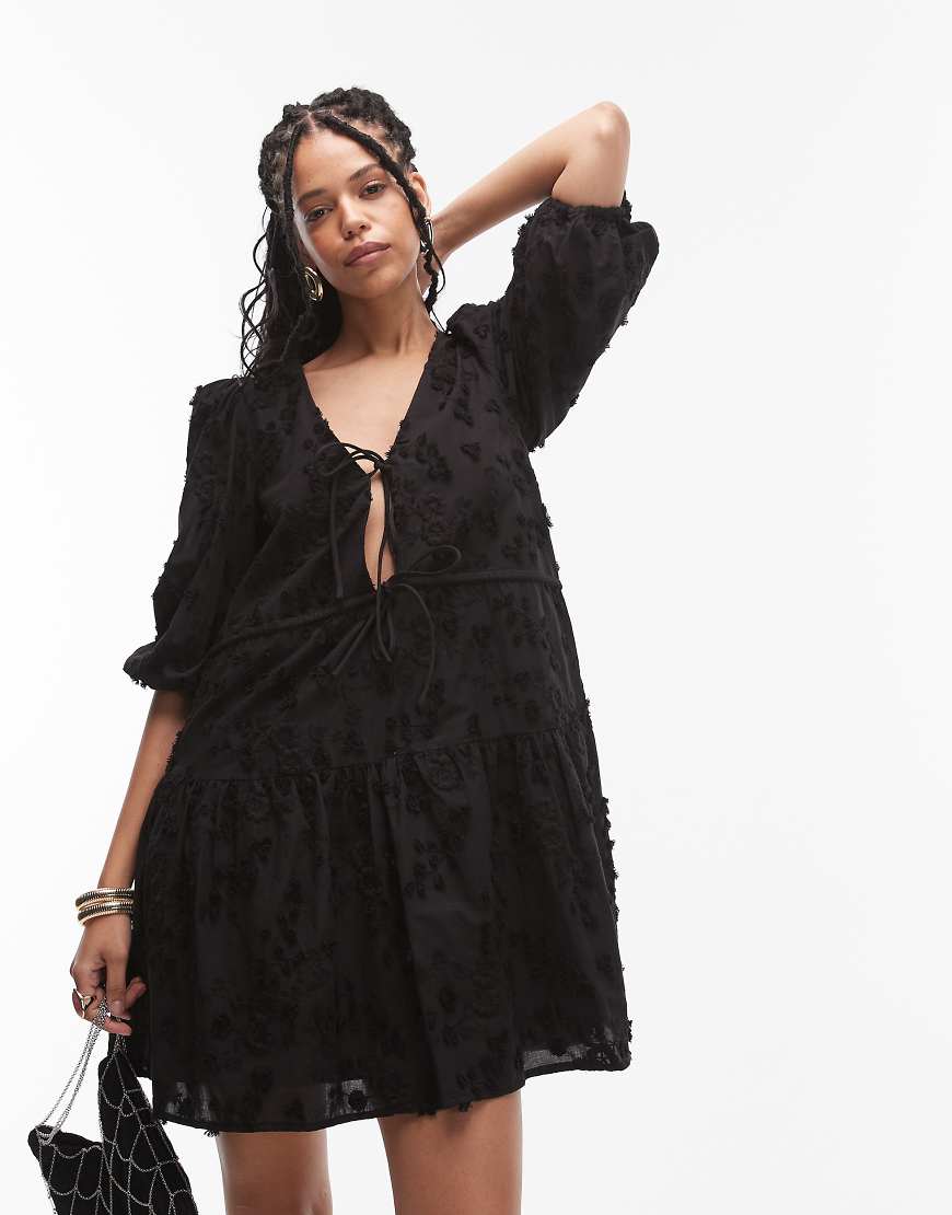 & Other Stories embroidered mini dress with front tie detail and tiered hem in black