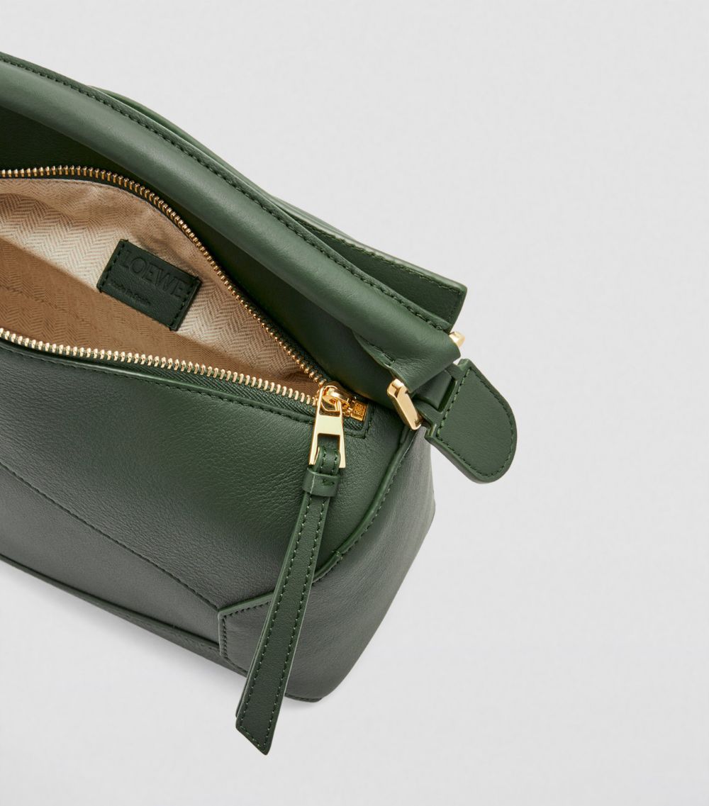 Small Leather Puzzle Edge Top-Handle Bag