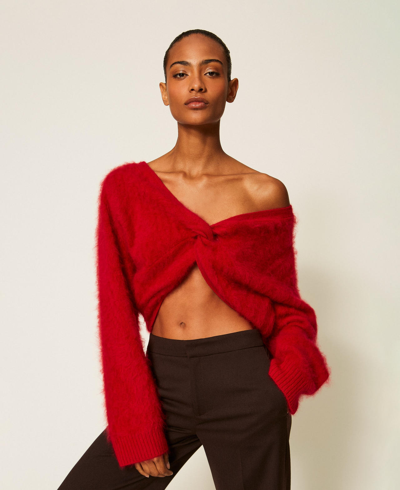 Brushed wool jumper with knot