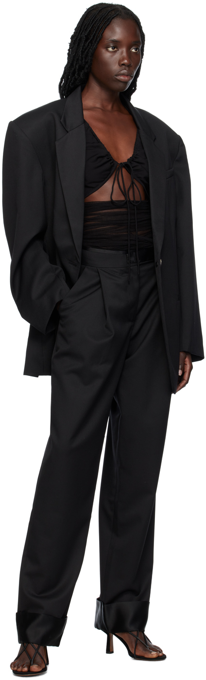 Black peg slacks