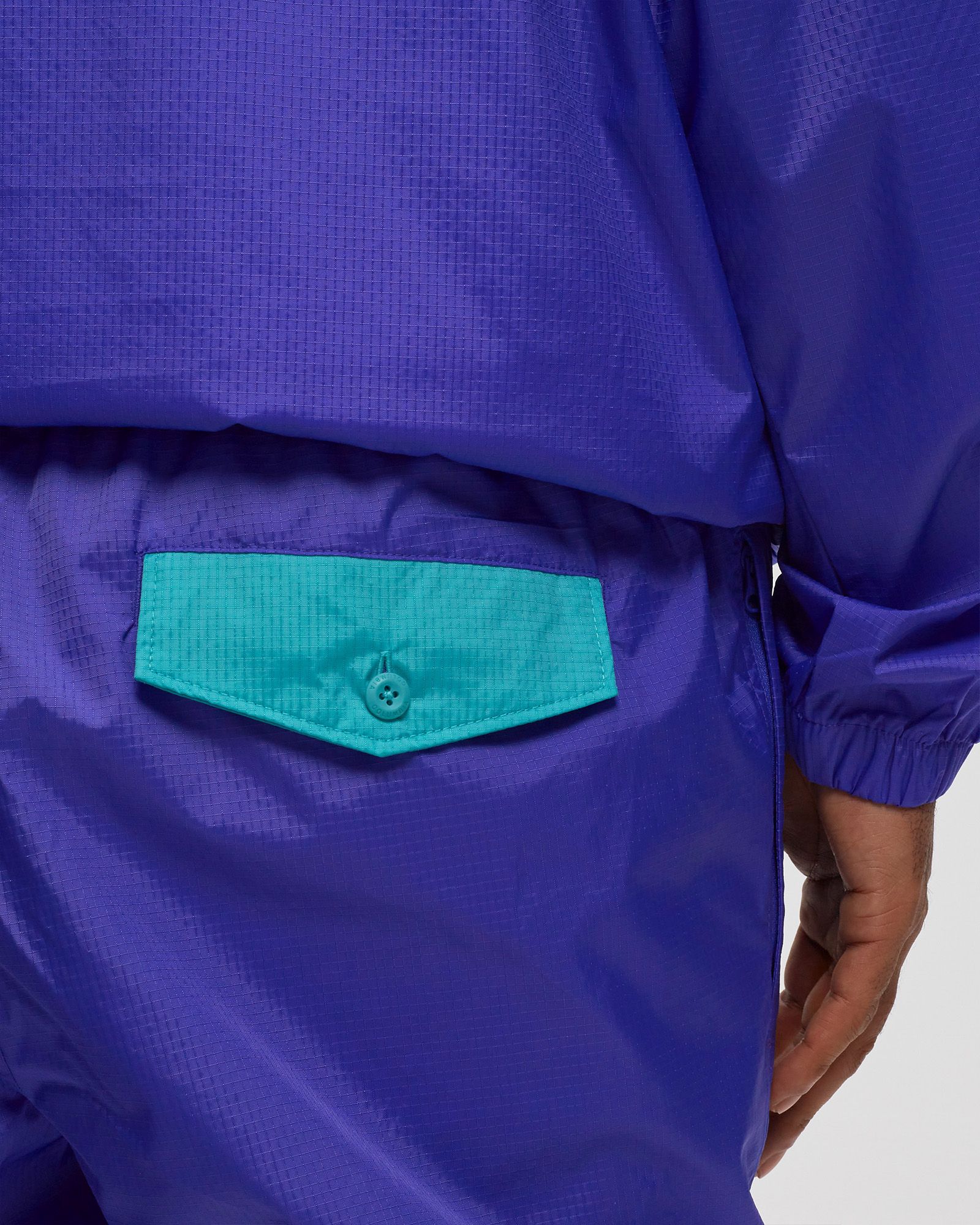 Columbia Riptide Wind Pant Purple male Track Pants now available at