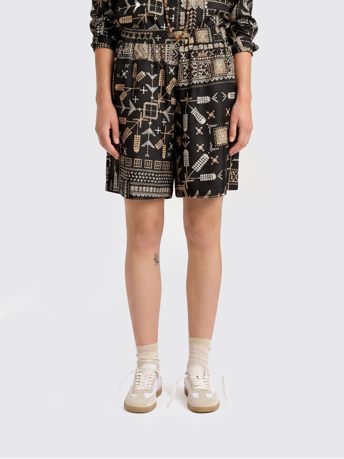 MOMONÌ Shorts Woman color Black
