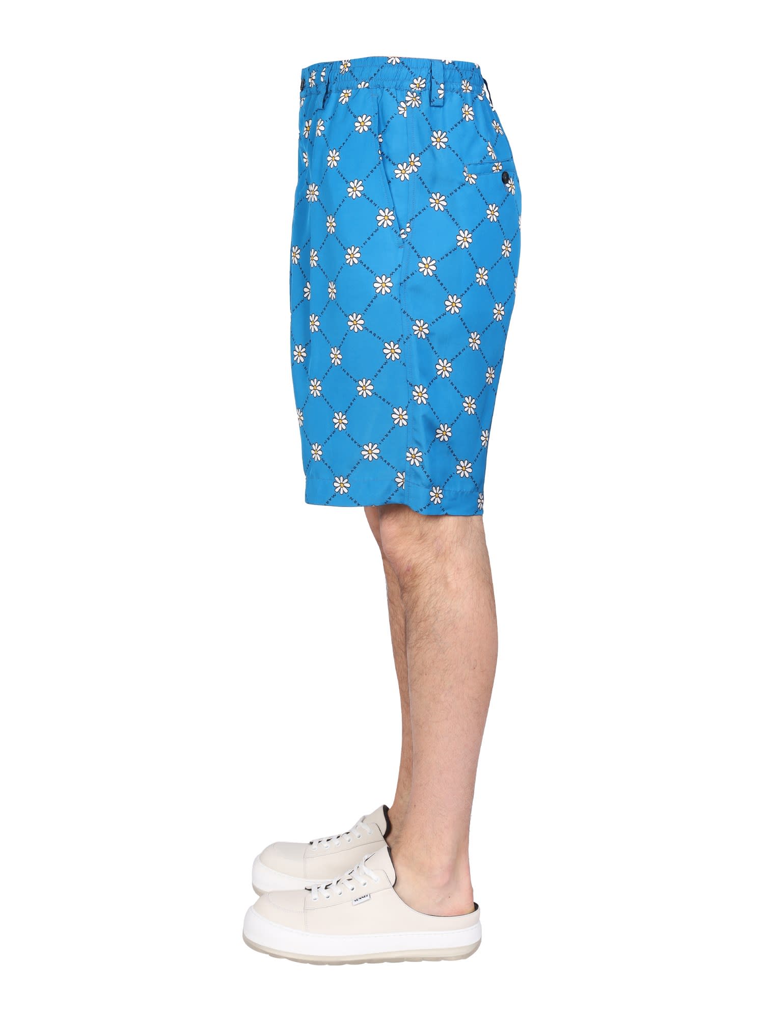 Daisy-print track shorts