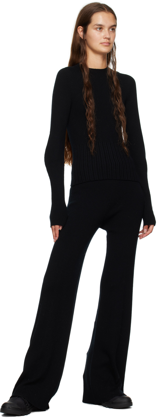 로우클래식 여성 블랙 패딩 부츠 222666F114000