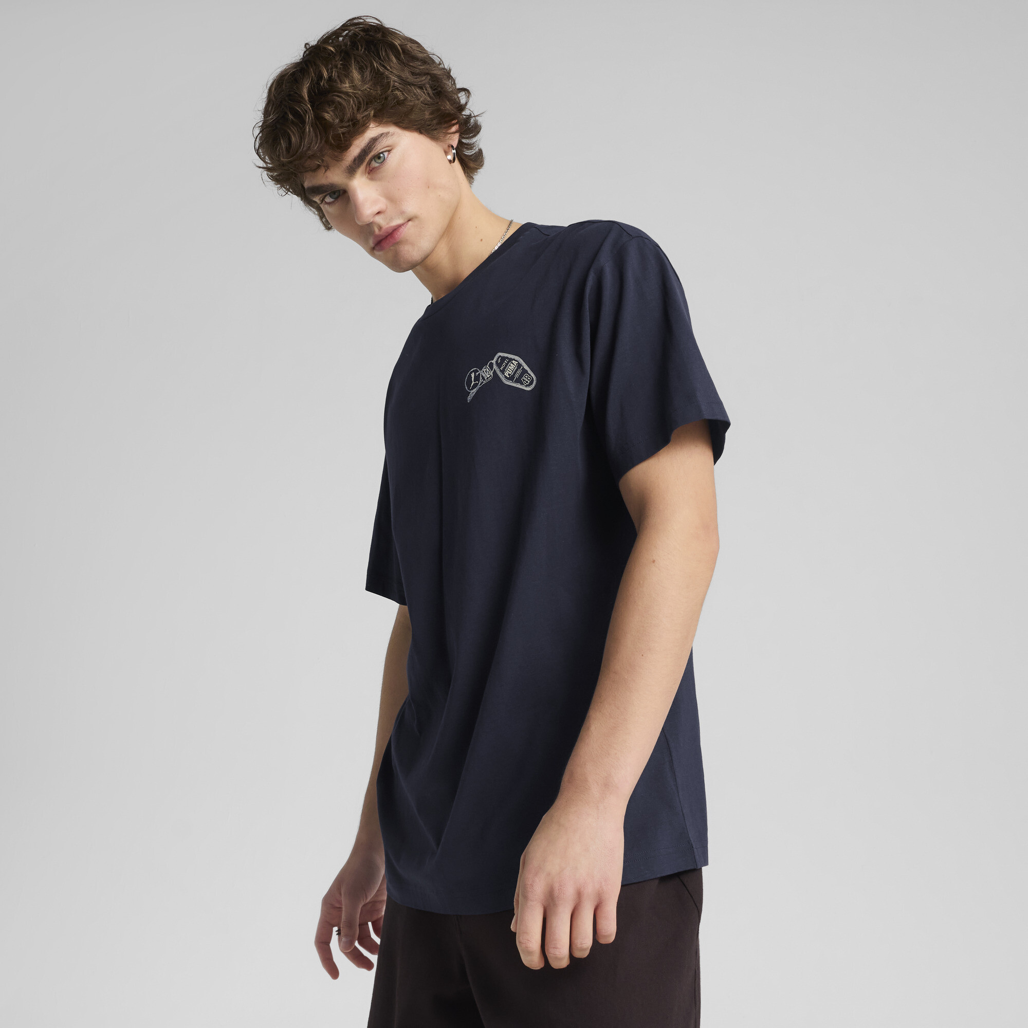 PUMA GRAPHICS Hotel Men's Relaxed T-Shirt in Blue