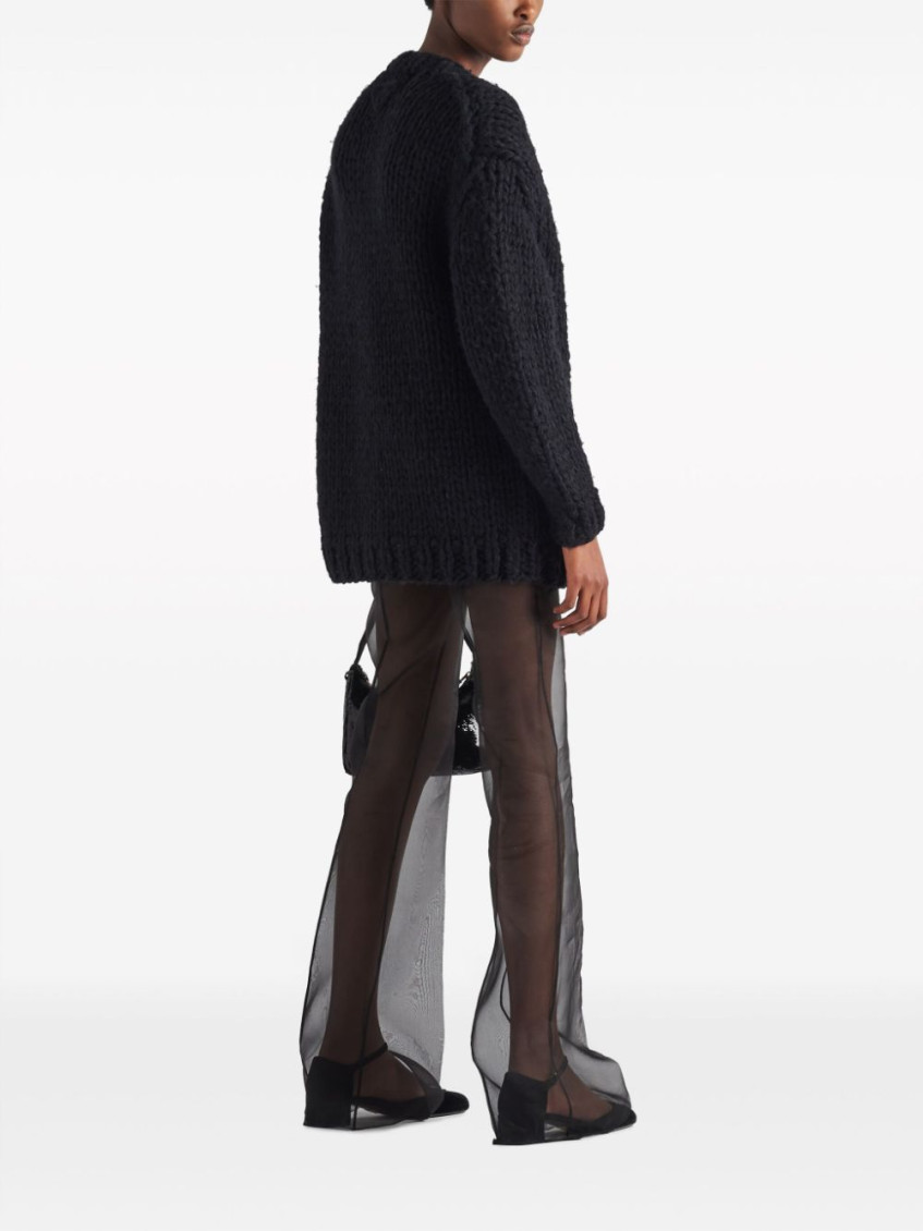 Black semi-sheer flared trousers