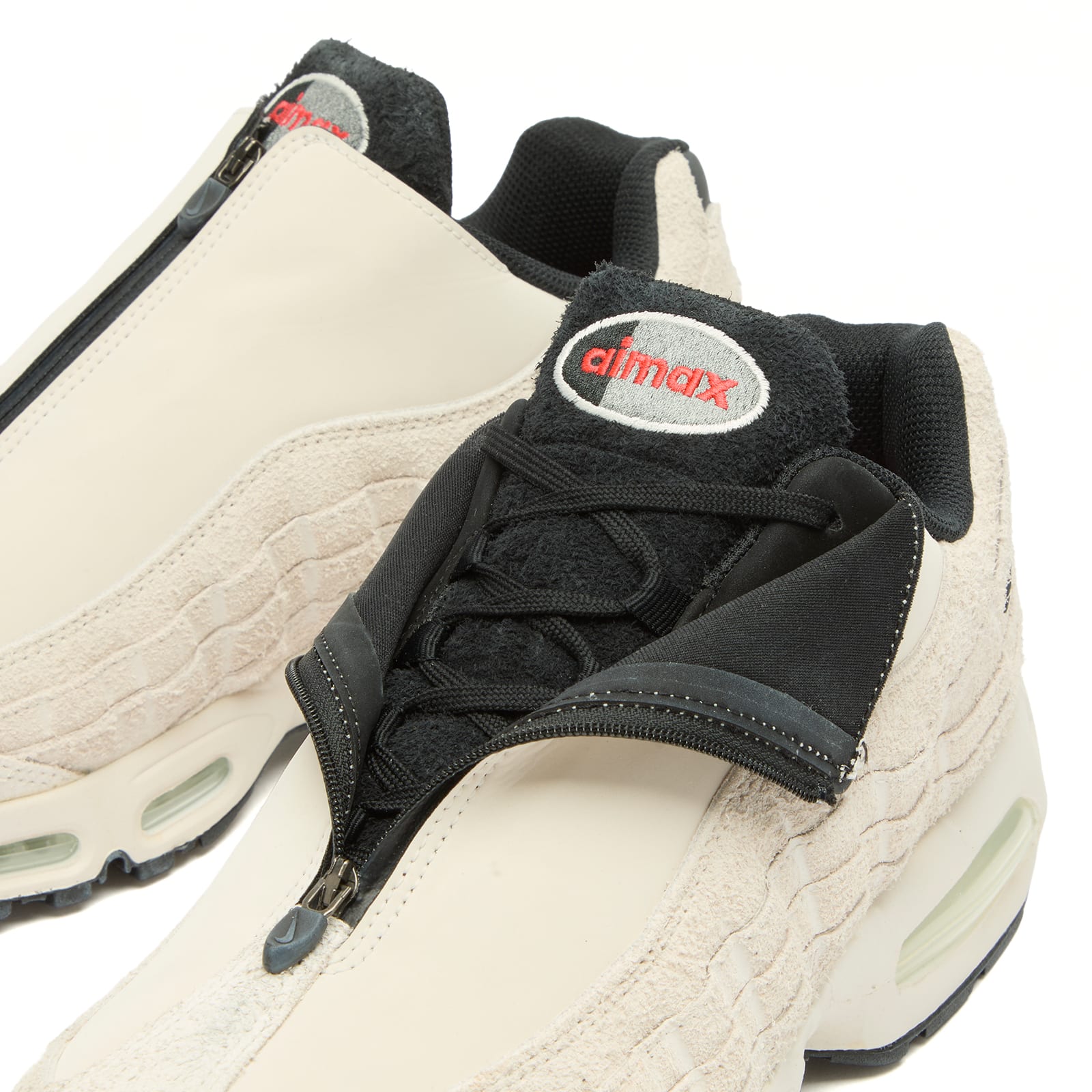 Men's Air Max 95 Zip SP Sneaker in Phantom/Black. Lt Crimson/Smoke Grey
