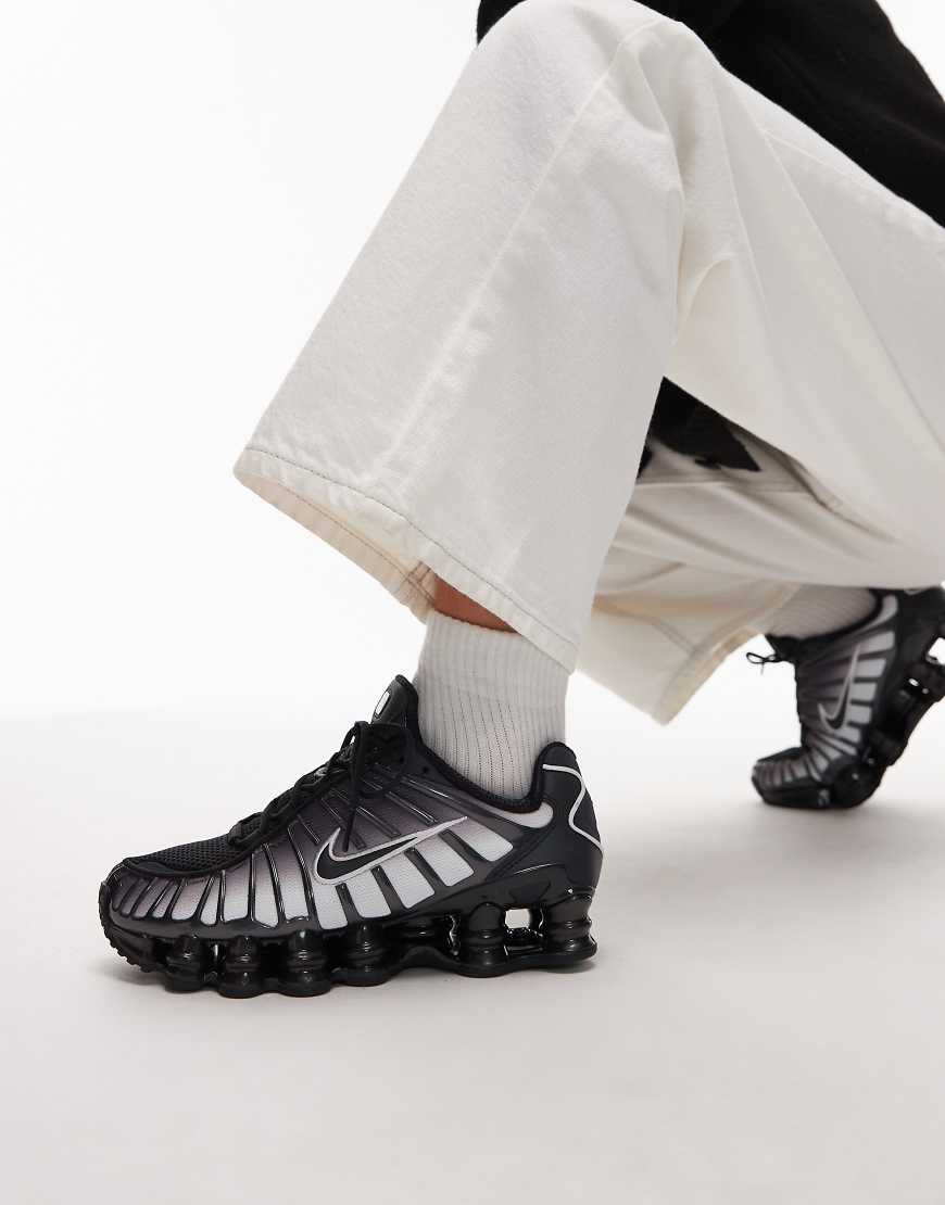 Shox TL trainers in black and white