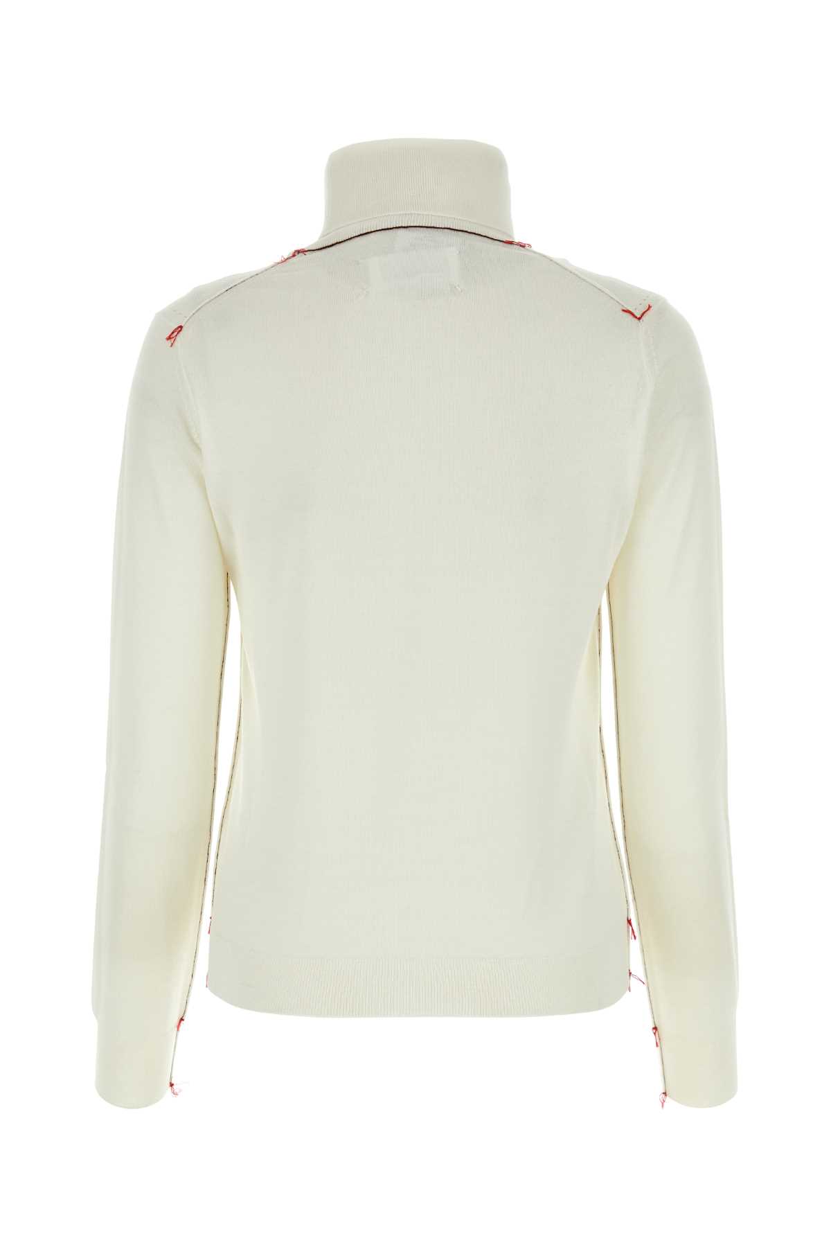 Roll-neck knitted jumper