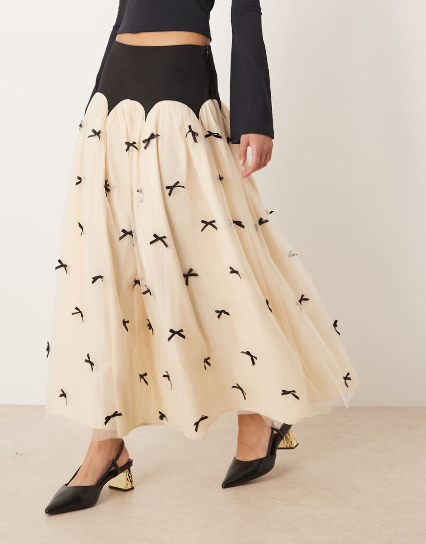 Contrast bow drop hem maxi skirt in black and cream