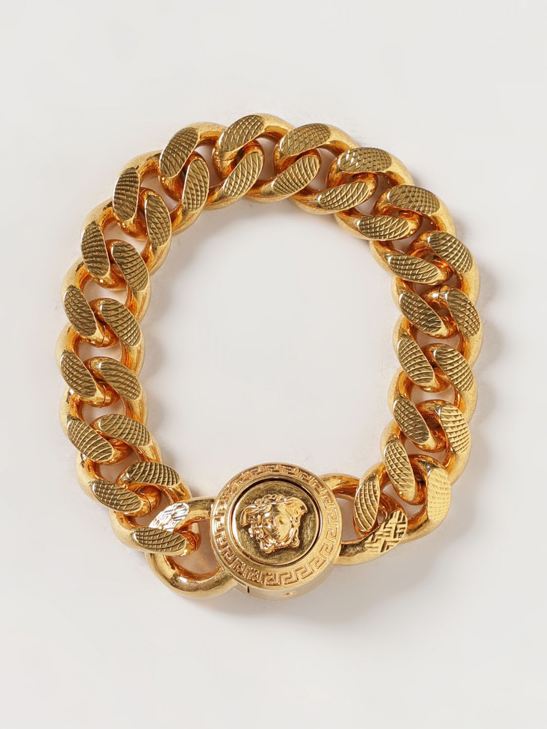 Gold-Tone Metal Bracelet with Embossed Medusa Detail