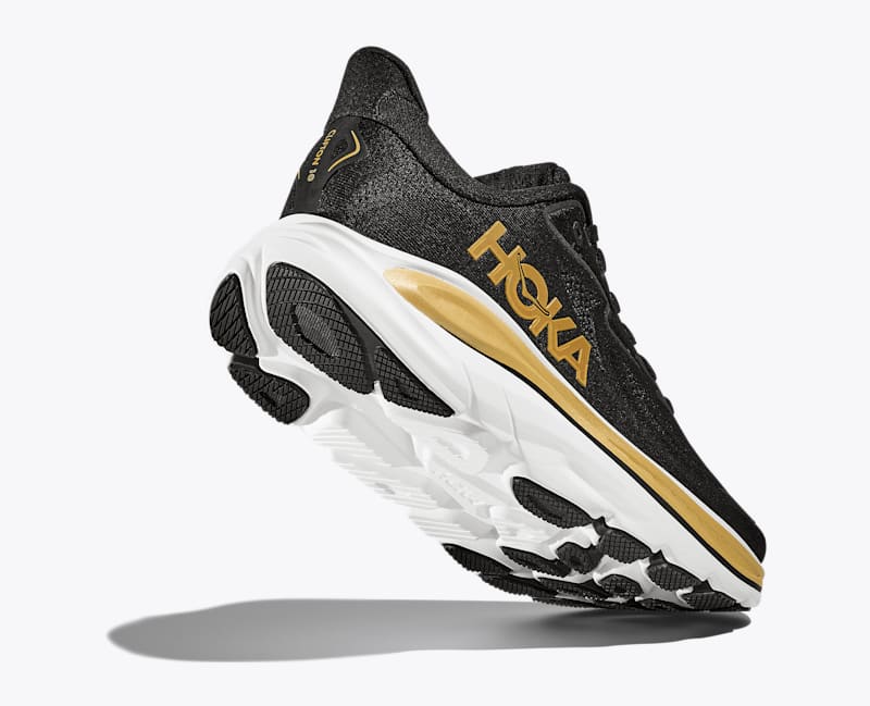 HOKA Women's Clifton 10 Shoes in Black/Gold