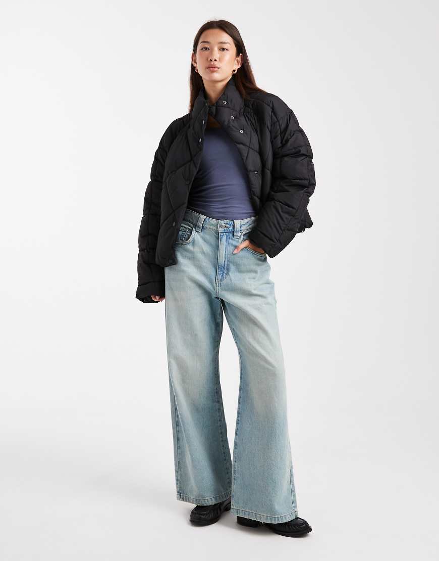 Oversized quilted funnel neck crop puffer jacket in black