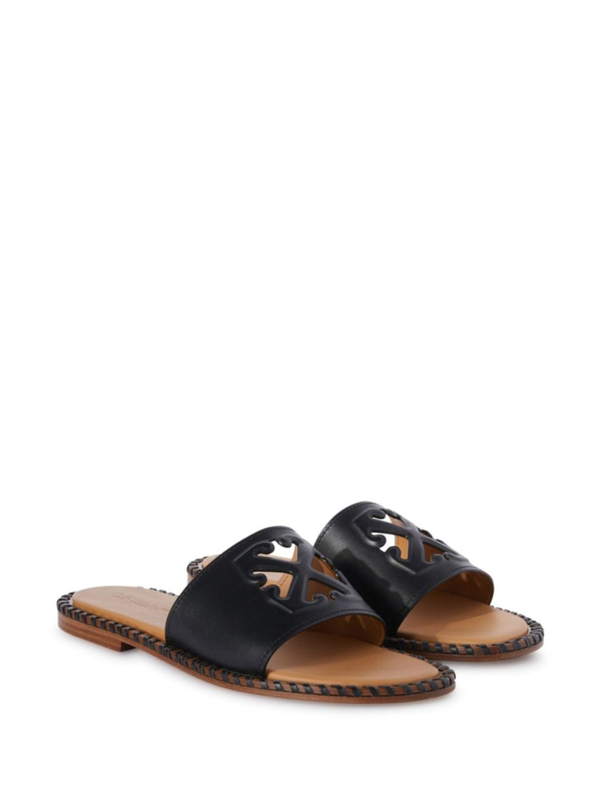 Twist Arrow-embossed leather slides - Black