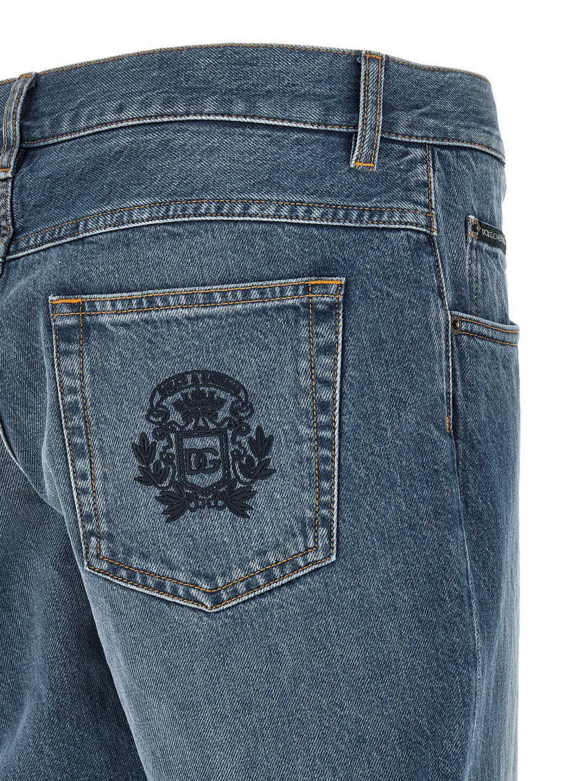 Blue Five-Pocket Jeans With Logo Embroidered On The Back In Denim Man