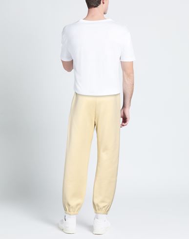 Man Pants Pastel yellow Size L Polyester, Elastane