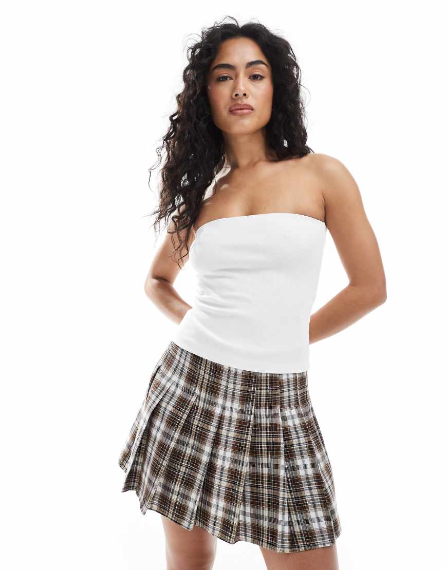 Plaid pleated mini skirt in brown