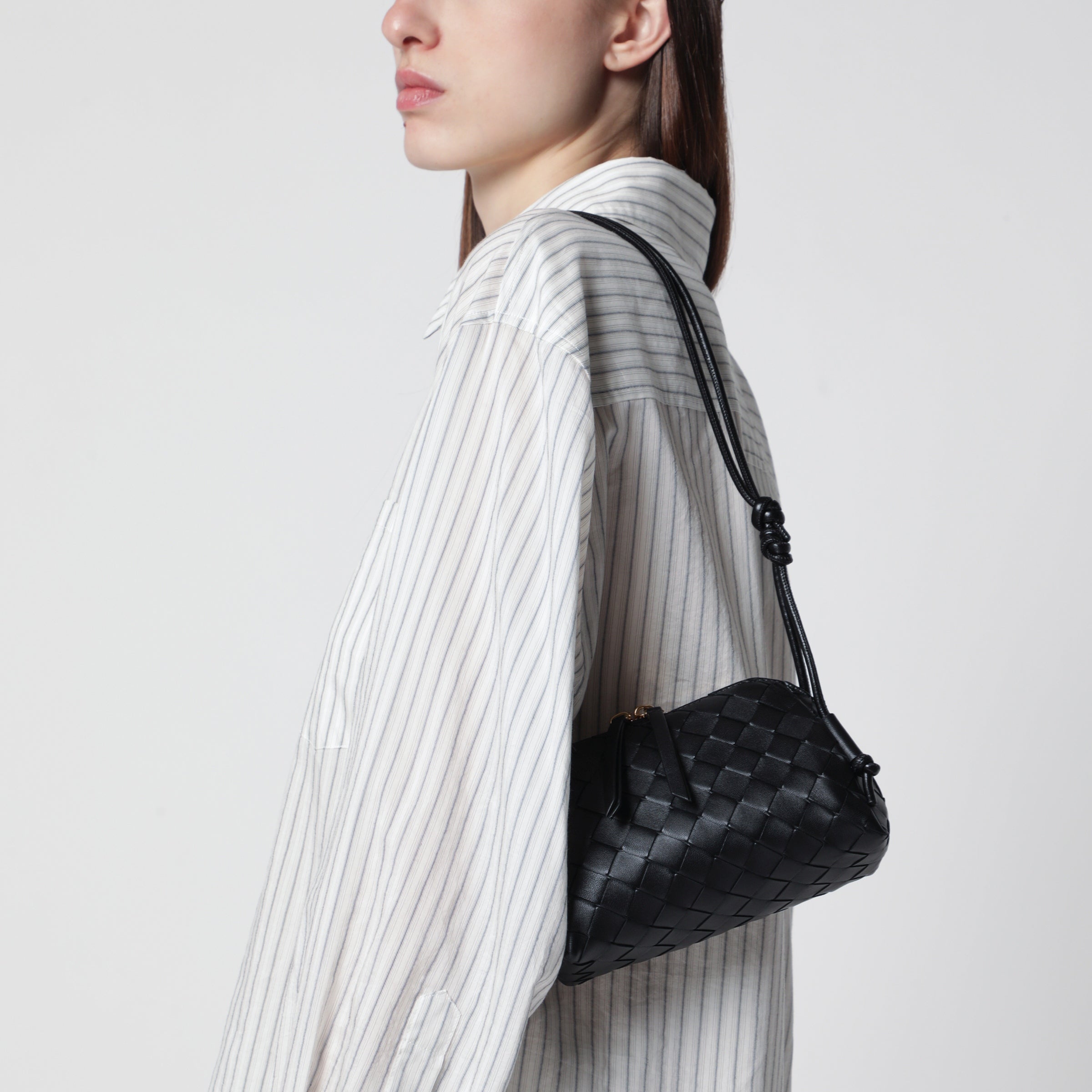 Black plaited Concert clutch bag