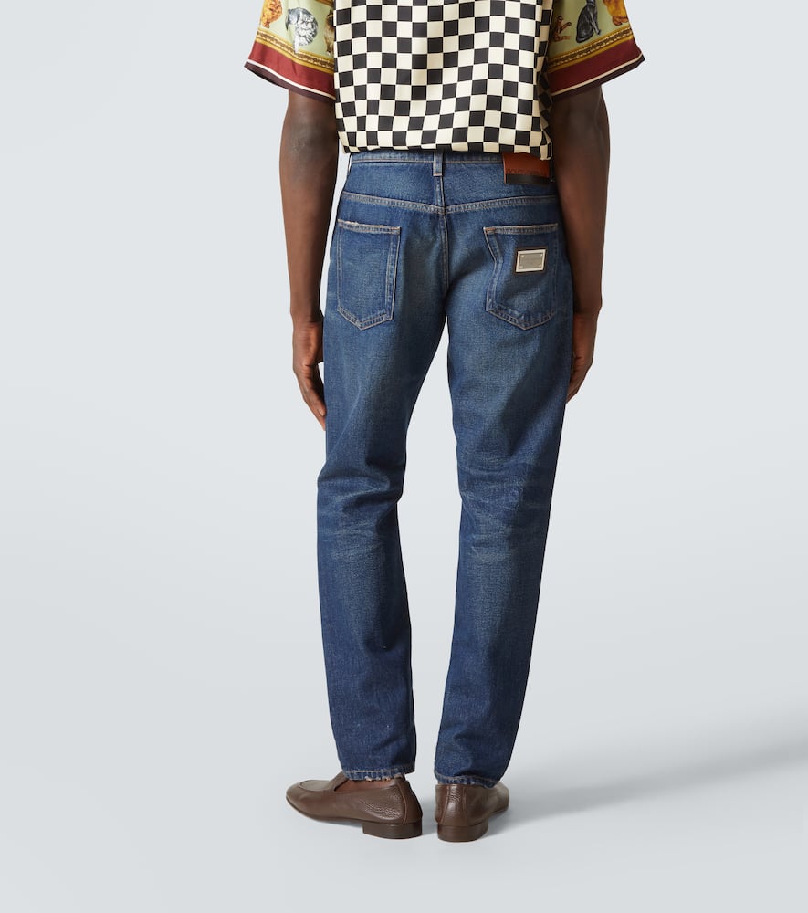 Distressed slim jeans