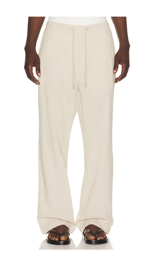 Far Afield House Trouser in Beige. S. Also in
