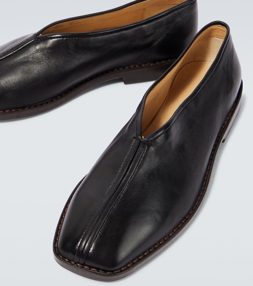 Piped leather loafers