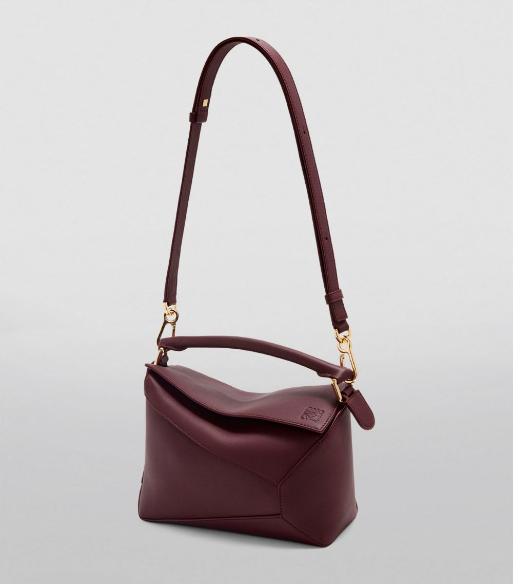 Small Leather Puzzle Edge Top-Handle Bag