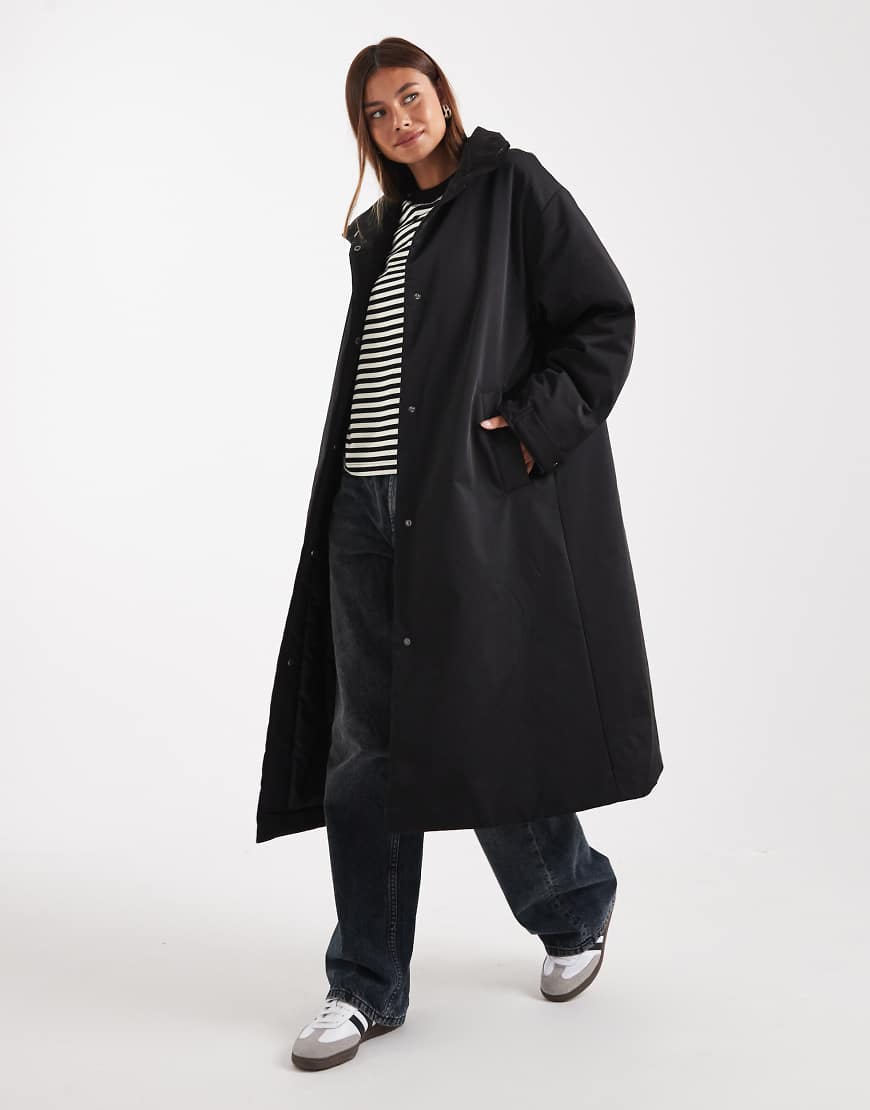 Clean longline padded jacket in black
