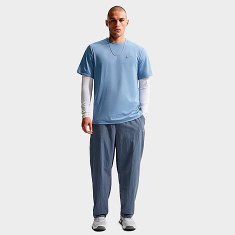 Men's N. A.C. Dri-FIT Woven Training Pants in Diffused Blue/Pale Ivory/Diffused Blue