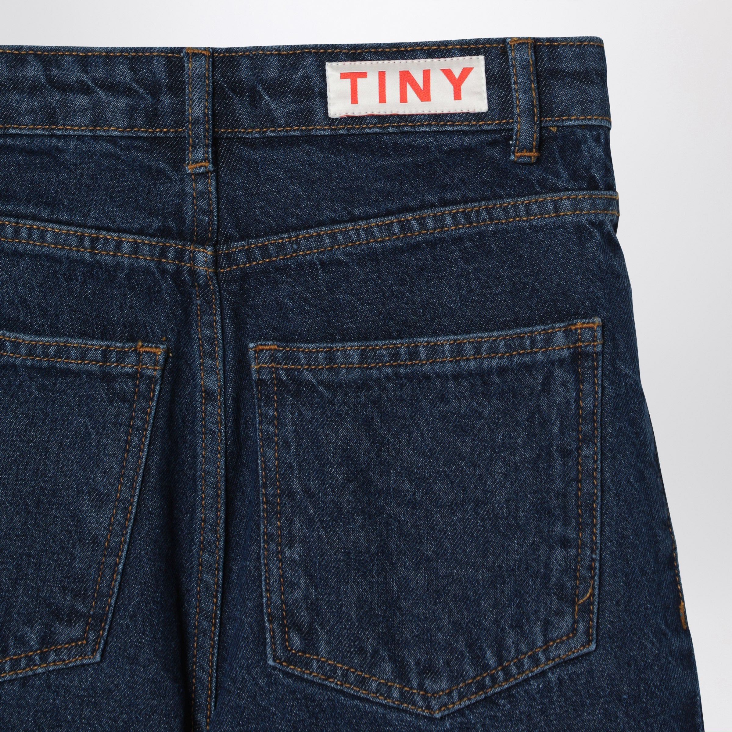 Dark blue jeans with embroidered mushrooms