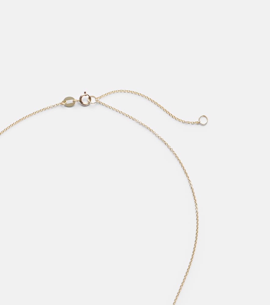 10kt gold charm necklace with garnet