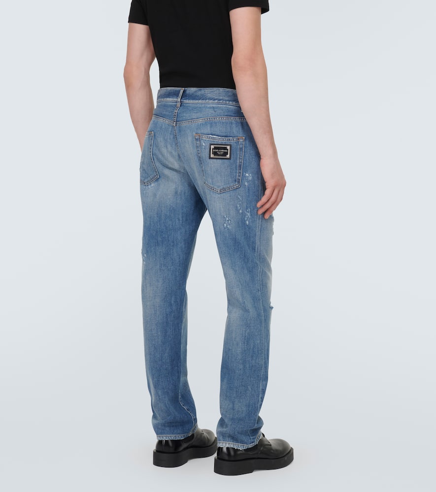Distressed straight jeans