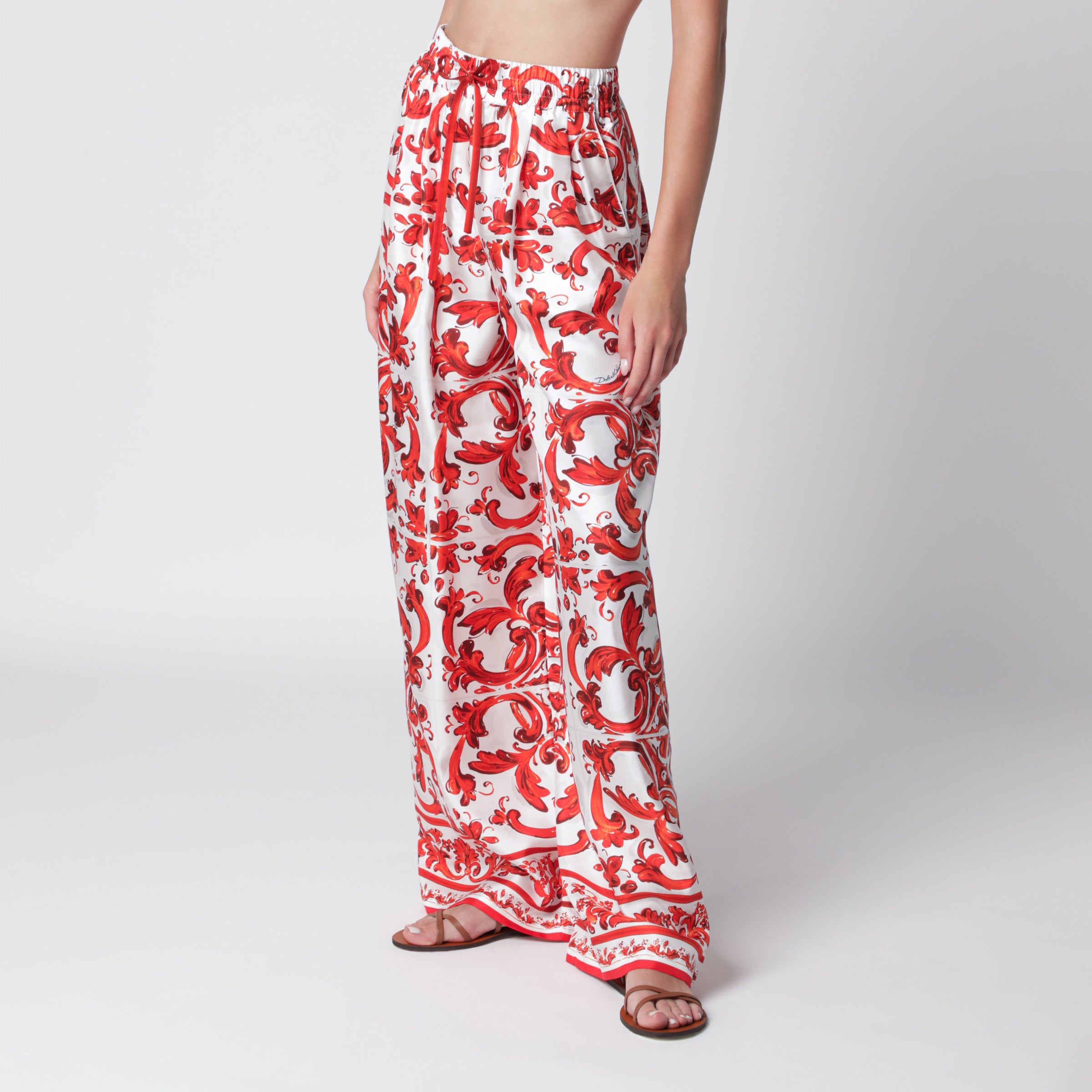 Wide-leg maiolica-print silk pants in orange