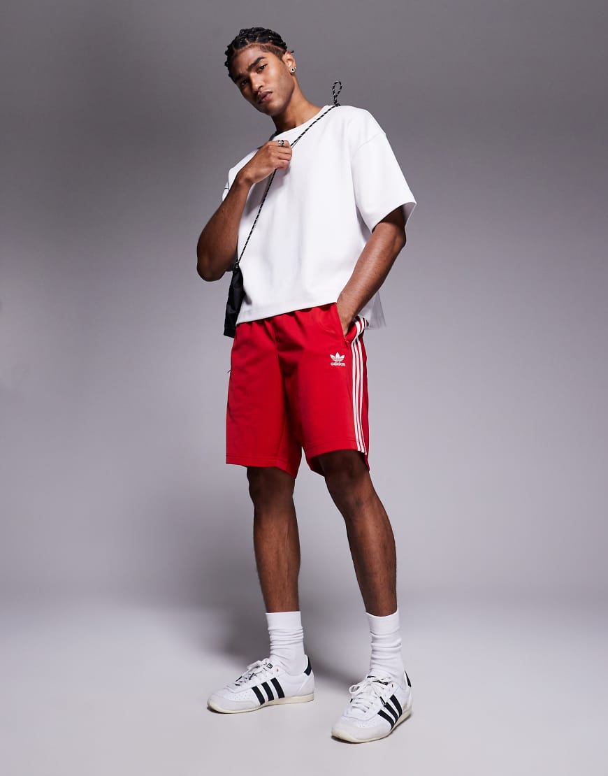 Adidas Originals Firebird shorts in red
