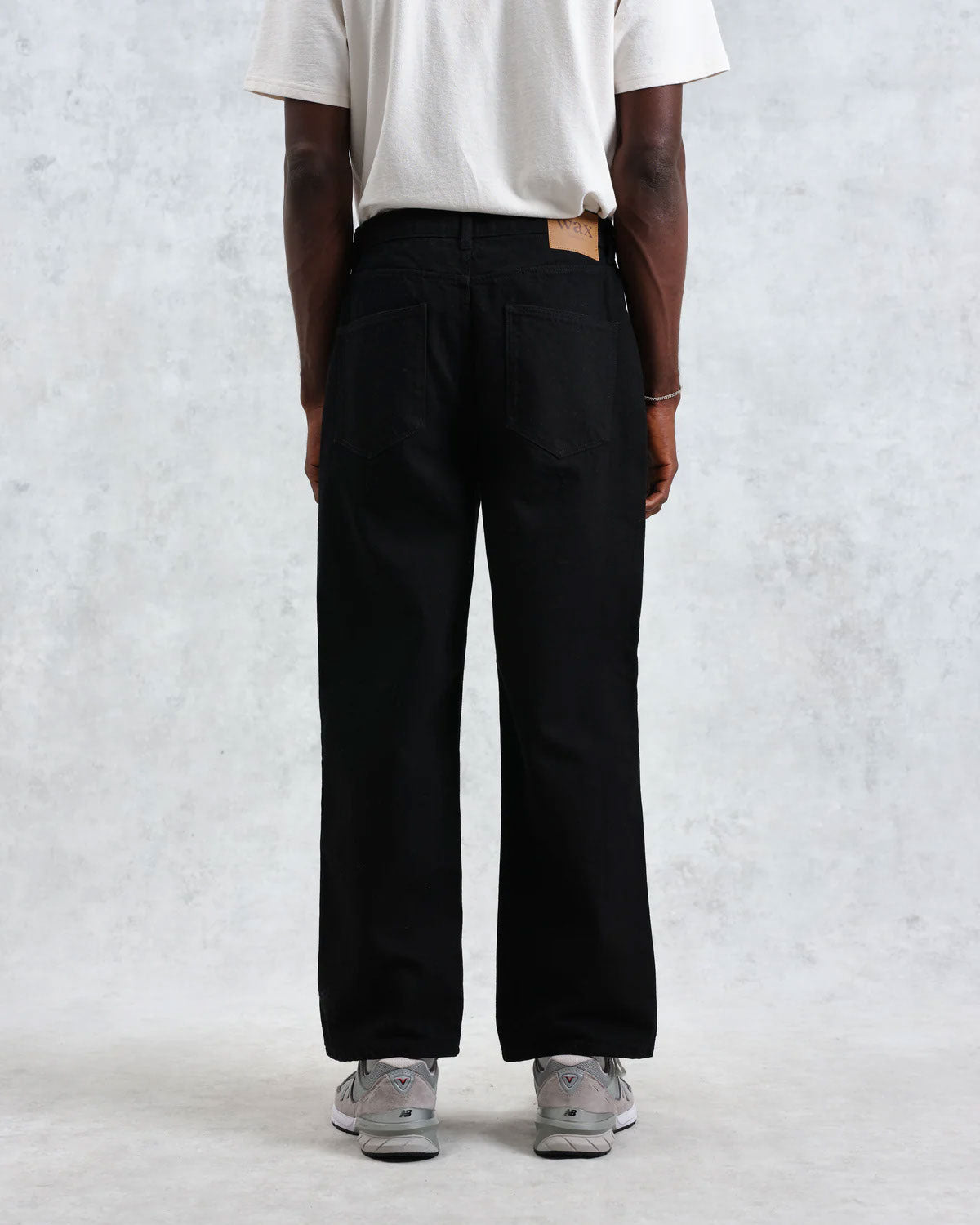 Pantalones londinenales de cera negro