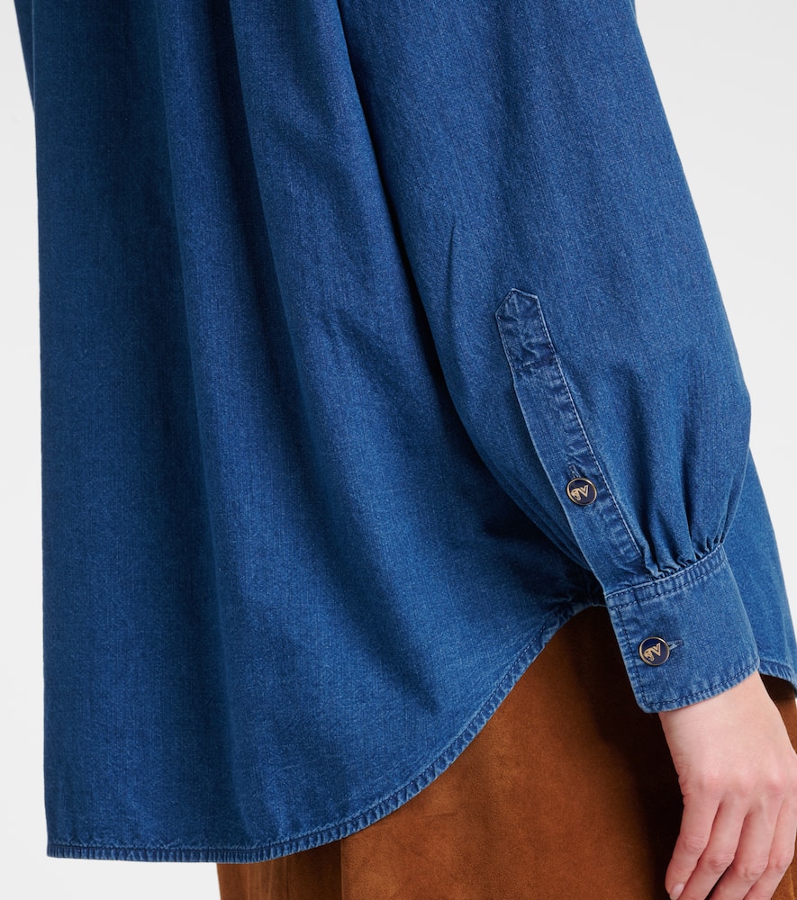 Ruffled denim blouse