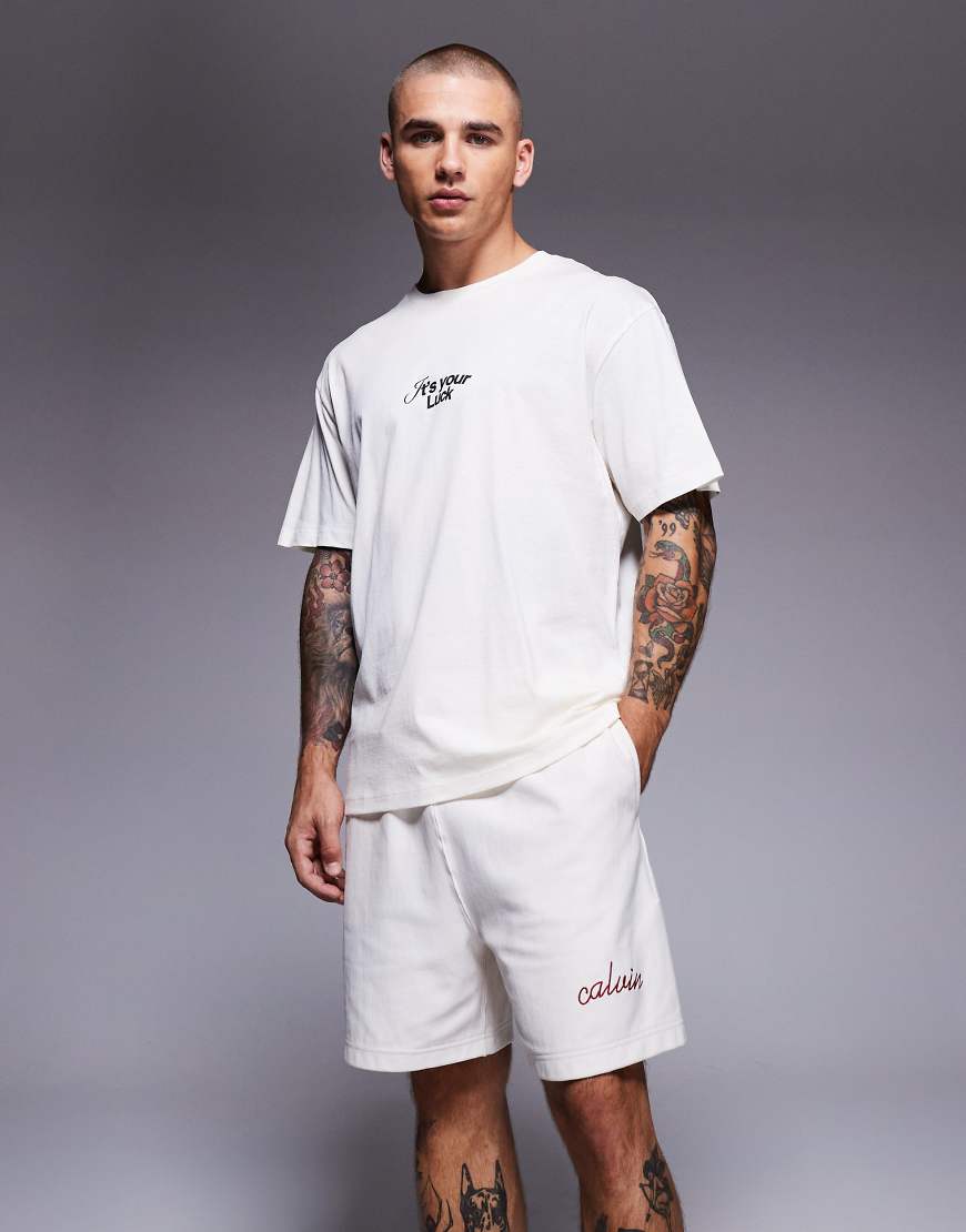 Premium stitch logo shorts in cream-White