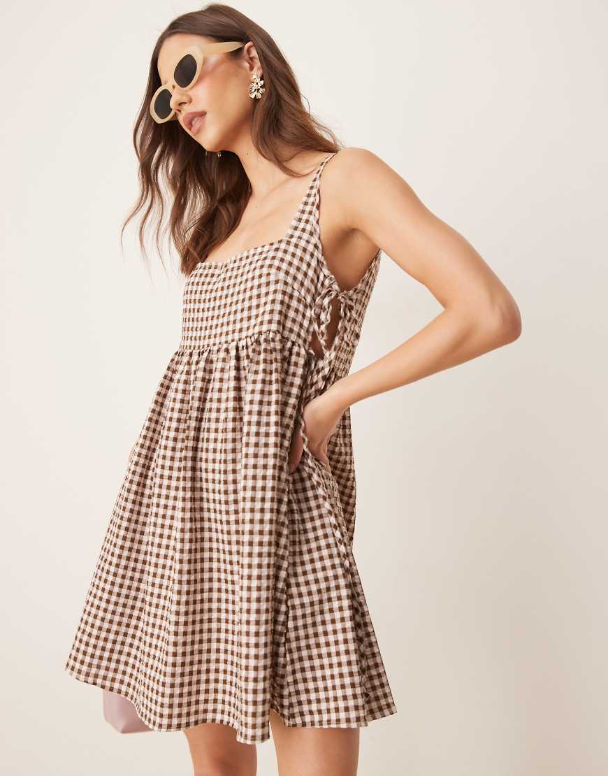 ASOS DESIGN tie side baby doll mini dress in brown gingham-Multi