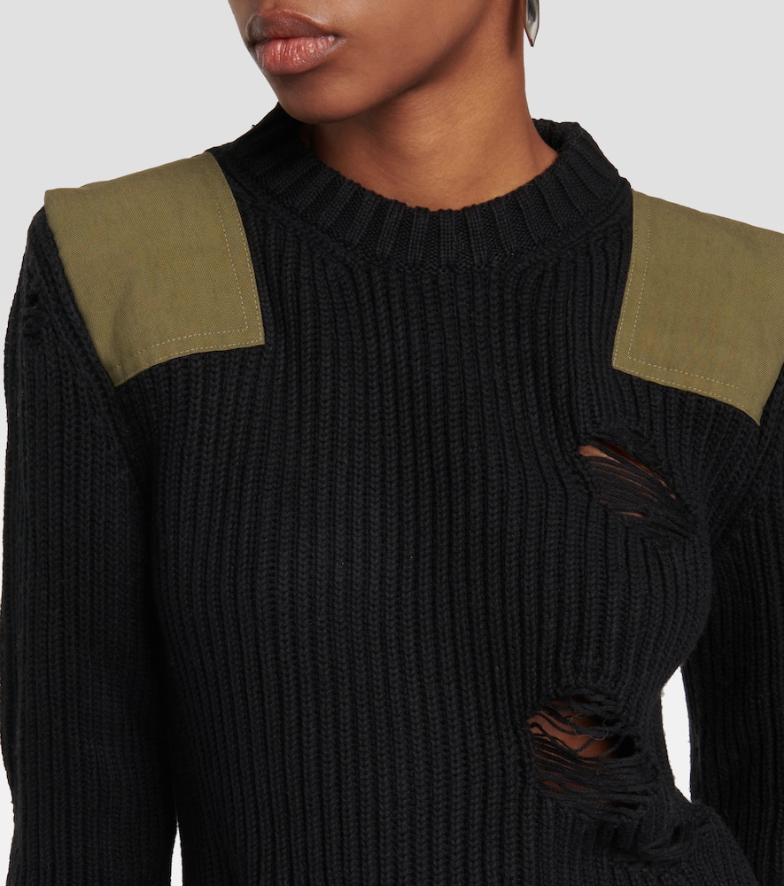 Distressed cotton and wool sweater