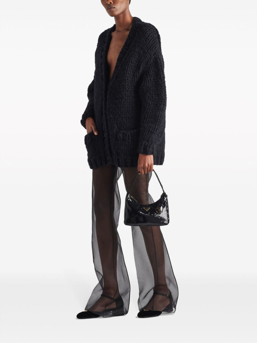 Black semi-sheer flared trousers