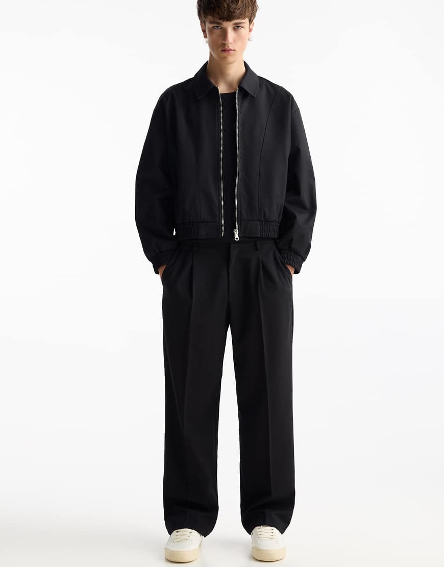 Tailored fit wide leg trousers in black