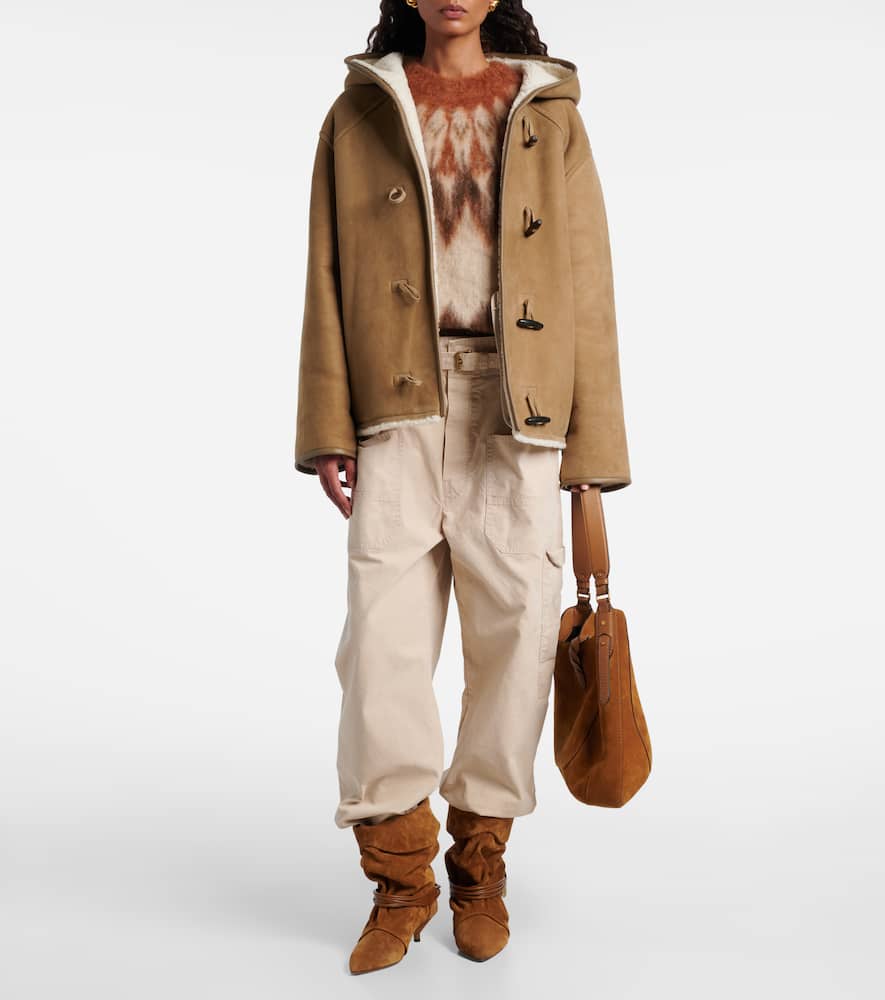 Reversible leather and shearling jacket