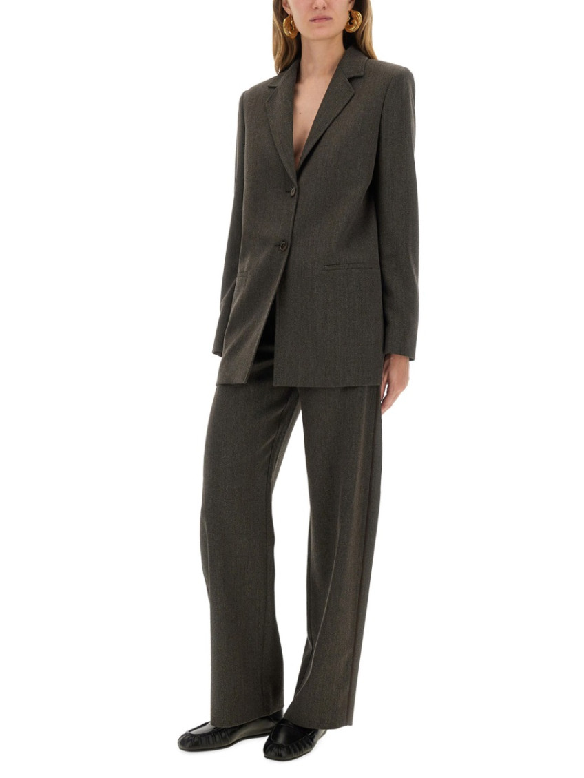 Moschino - longline jacket with front pockets and notched lape