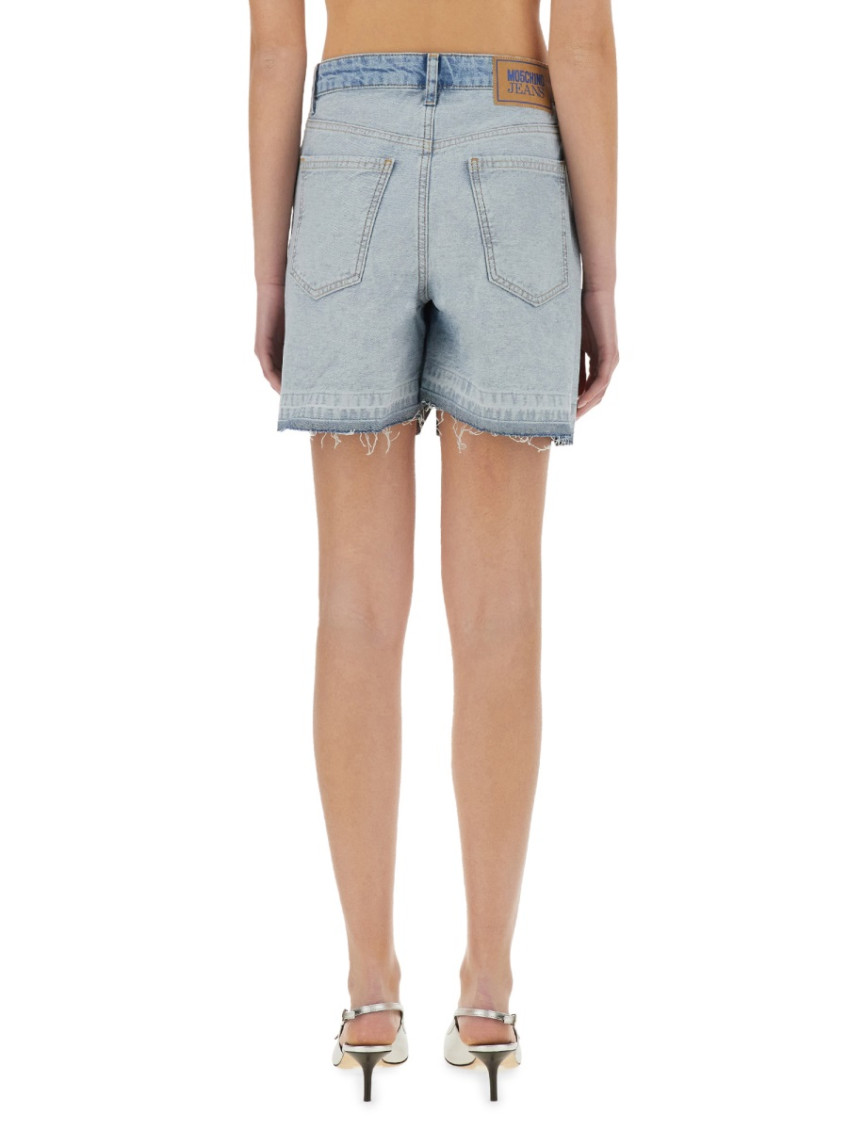 Moschino - distressed denim shorts with frayed he