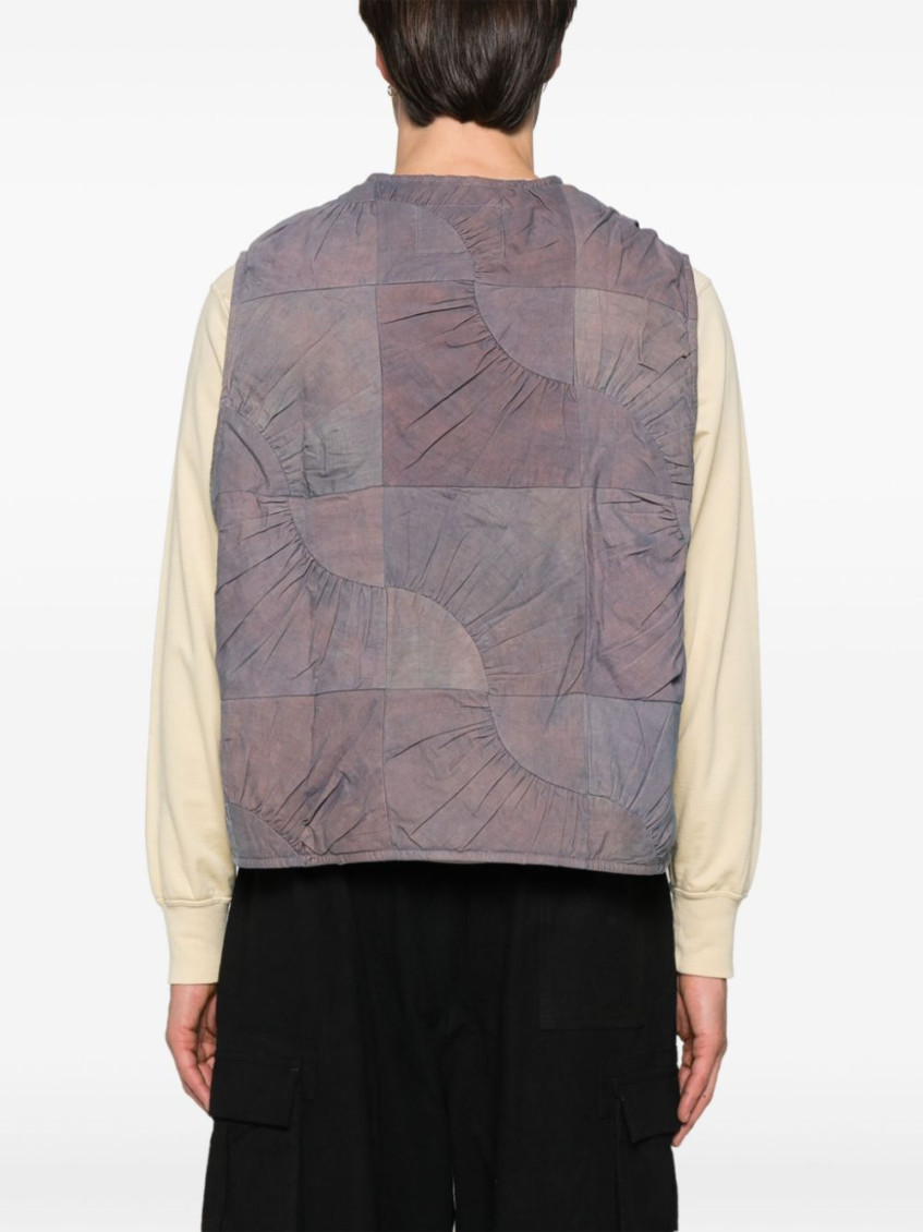 - Pluto Vest