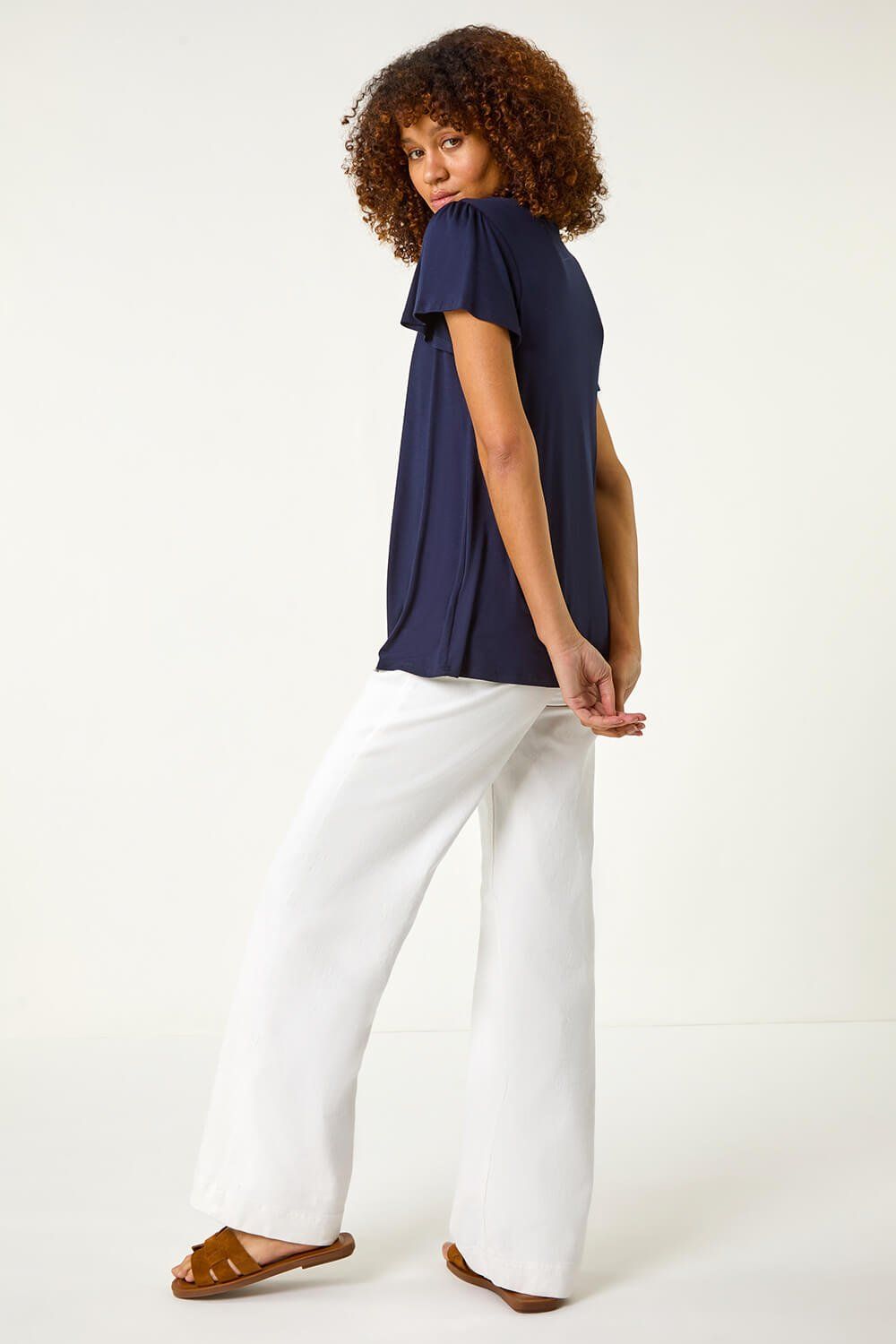 Roman Women's Daisy Applique Stretch Top in Navy